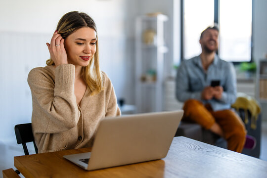 Successful female entrepreneur managing her online business from home, leading with confidence