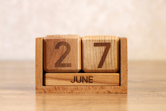 block calendar displaying June 27 as important date reminder milestone anniversary event or scheduled occasion summer concept