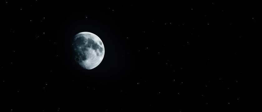 Banner with the moon on a black background, copy space