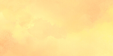 Fototapeta premium Warm yellow orange watercolor background texture with soft gradient and abstract brush strokes for design