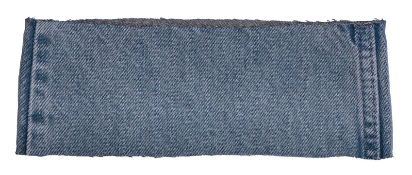 Isolated denim scrap of fabric with copyspace on white background	