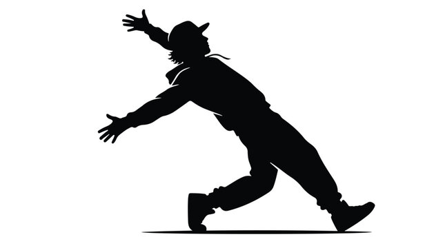 Silhouette of a male breakdancer balancing in action