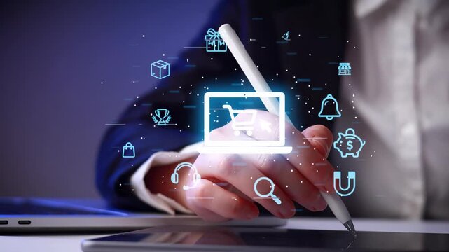 Hand writing on a tablet with digital shopping icons during a business presentation in an office setting.