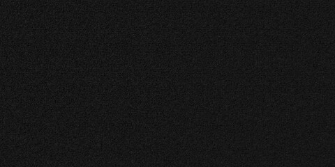 Fototapeta premium Dark film grain black paper texture background. Background wallpaper with old dust and scratch effec