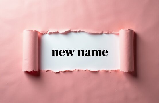 Torn paper reveals text new name. Concept for brand identity change, rebrand, or personal renaming. White background with pink ripped paper edges.