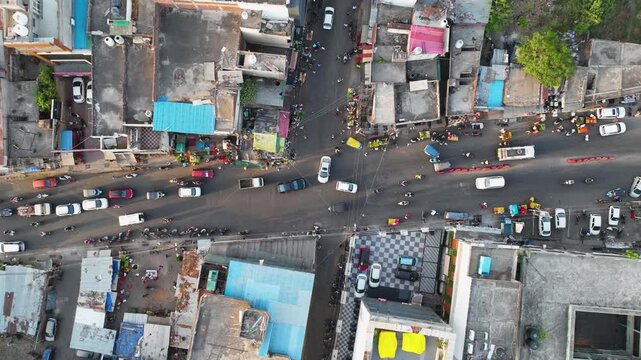 Aerial Hyperlapse of Busy Traffic Intersection and Dense Urban Housing