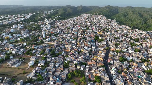 Unsustainable City Growth: Orbiting View of Overpopulated Infrastructure Destroying Green Cover