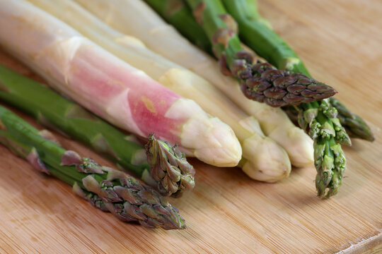 Heads of white and green asparagus.