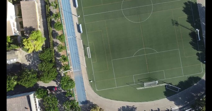 Aerial Drone View of sa pobla sports complex football field and Running Track in mallorca spain showing urban recreation and Community Infrastructure