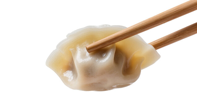 Steaming hot dumpling held by wooden chopsticks, isolated on transparent background