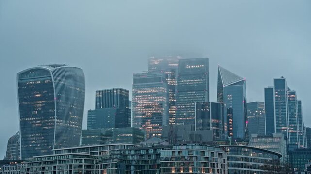 Stunning london skyline video, featuring modern skyscrapers like walkie talkie building and leadenhall building in soft foggy weather.