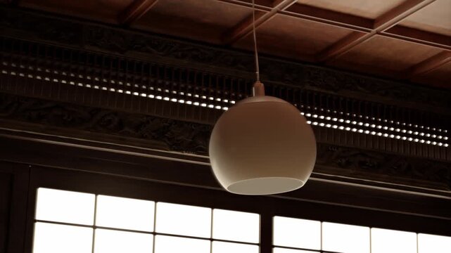 Retro lamp swinging back and forth in front of a Japanese gotenjo ceiling