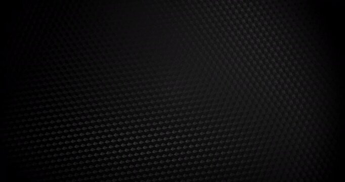 Black carbon fiber weave with subtle light shift, creating a high-tech, endlessly background.	