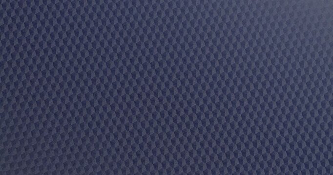 Blue Geometric Texture Seamless Rotation. Smooth continuous rotation of vibrant blue geometric diamond pattern texture. Seamless loop with subtle light reflections gliding across the surface.