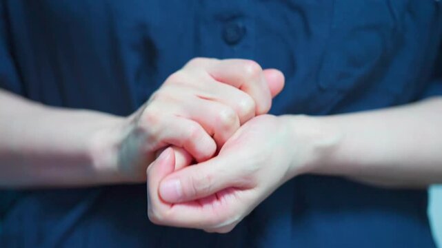 Nervous, hands and woman with anxiety in home with stress, mental health or overthinking