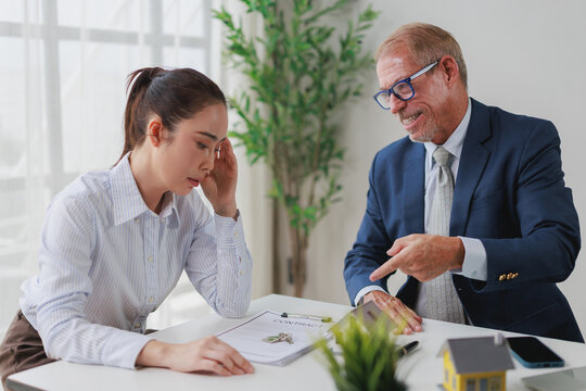 Worried woman discussing debt and mortgage terms with aggressive financial advisor, facing real estate contract issues and struggling with legal agreement stress