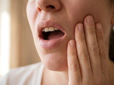 Close-up of a Person Suffering from Severe Toothache.