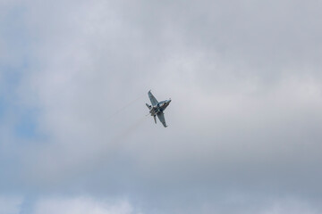 Obraz premium F/A-18 An F/A-18 performing maneuvers with its landing gear deployed at an air show in Salamanca, Spain May 10, 2026