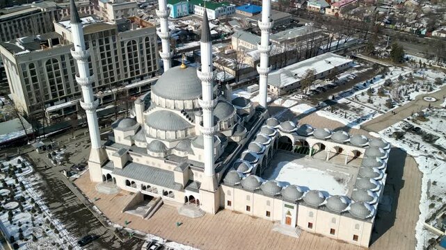 Imam Sarahsi Bishkek Central Mosque, drone zoom-in rotation shot
