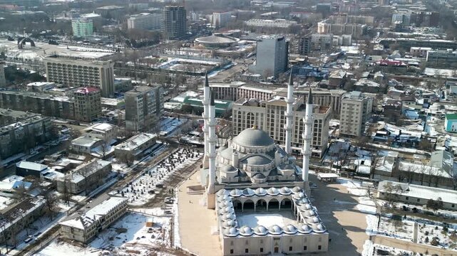 Imam Sarahsi Bishkek Central Mosque, drone sideways flight shot