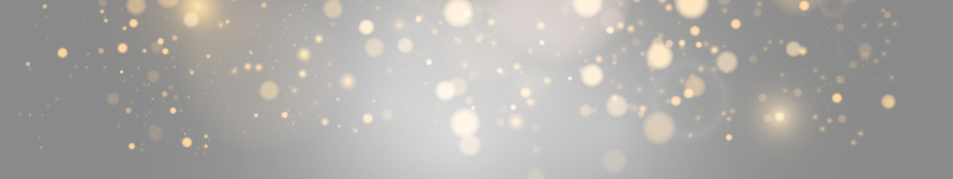 Panoramic banner of golden glitter bokeh lights falling from top on grey background