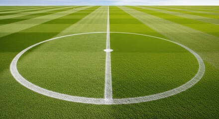 Obraz premium Close up view of centered soccer ball on white circle mark on green grass field.
