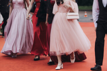 Naklejka premium Red carpet on a movie premiere, cinema film festival event, ropes and golden barriers on a luxury party entrance, awards gala ceremony, wealthy rich guests arriving, outdoor venue decoration elements