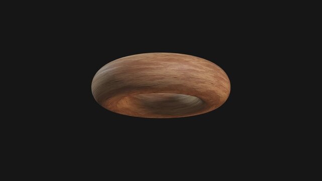 A drag and drop 3D carved wooden style shape with alpha that spins on a loop.
