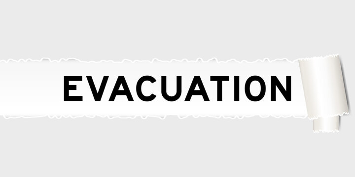 Ripped gray paper background that have word evacuation under torn part