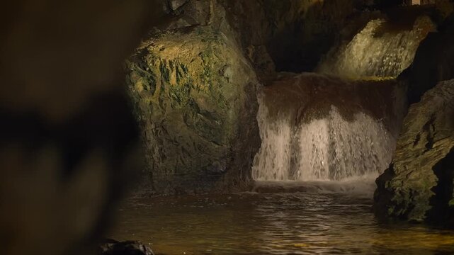 inside view of stone cave and river landscape