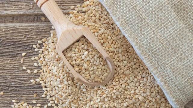 sesame seeds on table with linen bag natural minerals