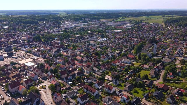 Luftbild und Drohnenaufnahme der historischen Stadtlandschaft in Krumbach. cenic drone panorama of the rural town landscape and green nature in Southern Germany in summer. Drone shot of Krumbach