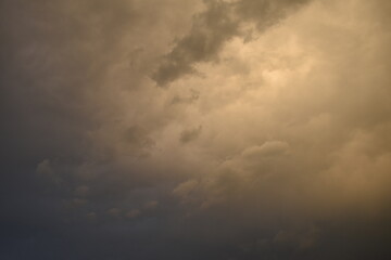 Fototapeta premium Sunset sky covered with dark clouds
