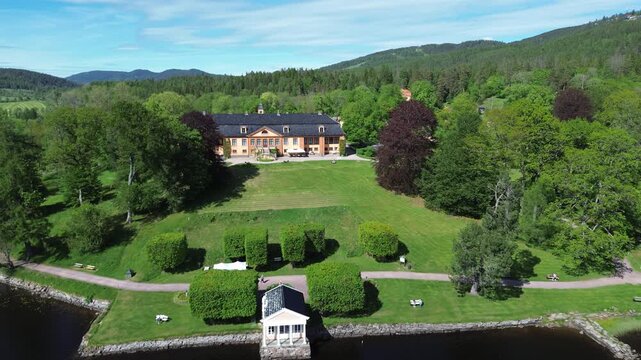 Panoramic drone view from Oslo, Norway. Arial view at Bogstad with farms and forest landscape.