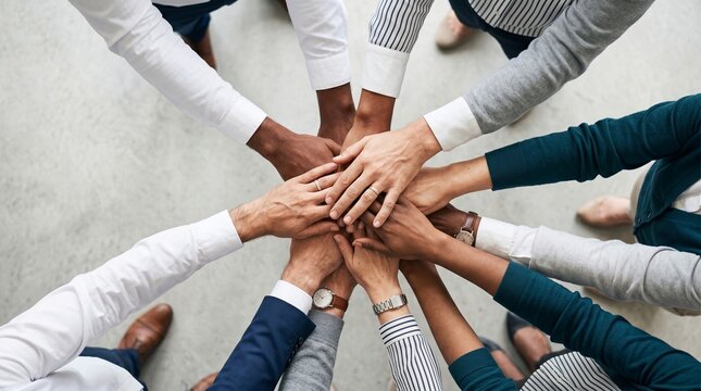 Diverse Team Hands Stacked Together Symbolizing Unity and Collaboration