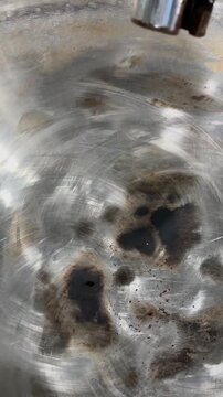 Damaged metal component in food processing equipment highlighting the importance of preventive maintenance, equipment inspection, and food safety management systems.