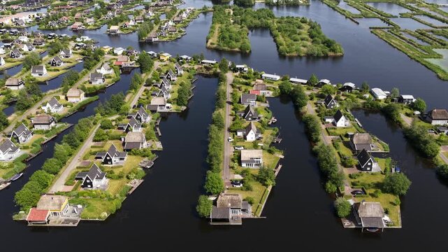 Dutch village with houses on islands and canals
