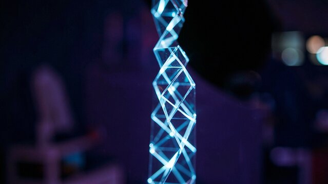 Cyan geometric helix structure symbolizing complex digital data network