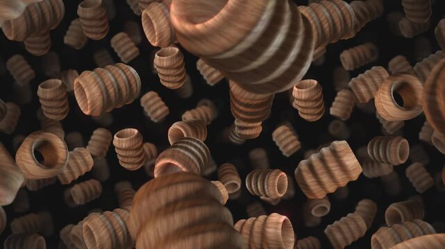 A background of spinning 3D carved wooden style shapes on an endless loop.
