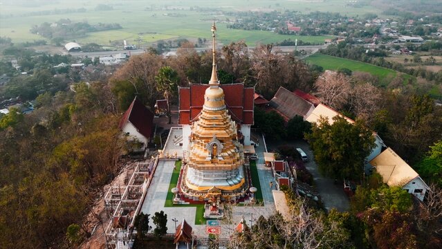 Golden chedi at wat phra that doi kham temple overlooking chiang mai valley