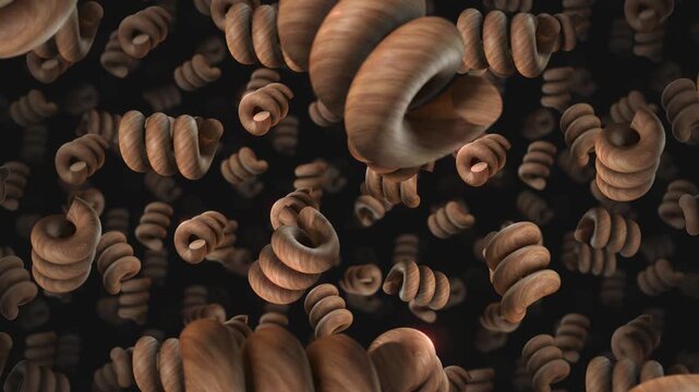 A background of spinning 3D carved wooden style shapes on an endless loop.
