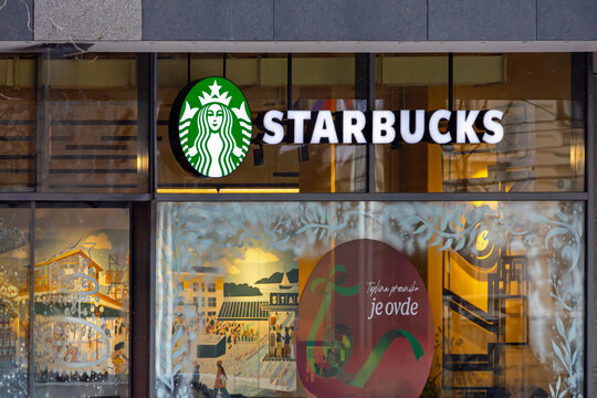 Starbucks coffee shop chain window on a street in Belgrade capital of Serbia