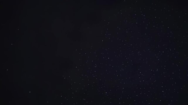 Vibrant white fireworks explosion illuminating the dark night sky in a celebration of light providing a mesmerizing visual experience with dynamic motion captured in this high quality festive event vi