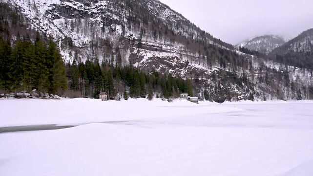 A winter of magic and mystery. Lake Predil in winter. Tarvisio.
