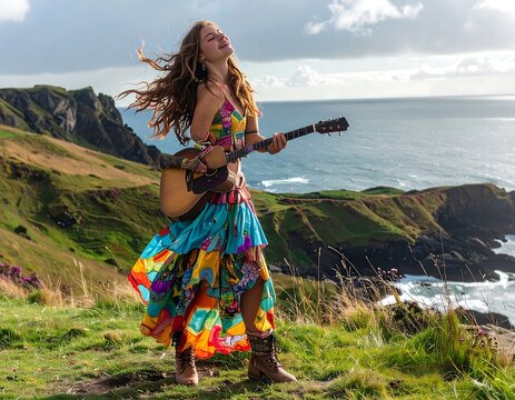 Woman in colorful dress standing on coastal cliff.