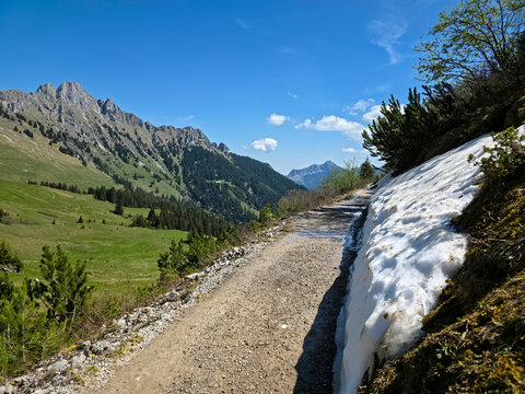 Austria, Rocky alpine landscape overlooking deep valleys forests and breathtaking mountain panoramas from Hahnenkamm