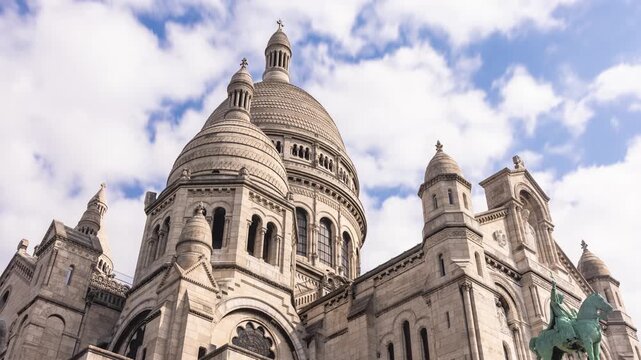 Time Lapse of clouds passing behind the Basilique du Sacr&eacute;-C&oelig;ur de Montmartre in Paris France.
