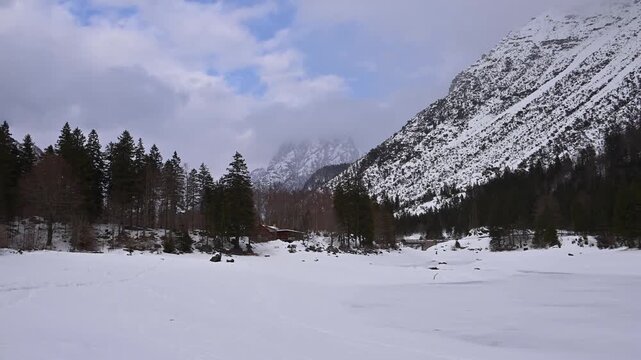A winter of magic and mystery. Lake Predil in winter. Tarvisio.