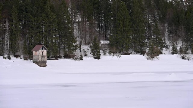 A winter of magic and mystery. Lake Predil in winter. Tarvisio.