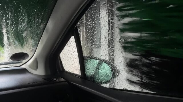Automatic car wash point of view from inside vehicle